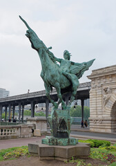 France Reborn Statue on Bir-Hakeim Bridge.On the bridge there are tourists