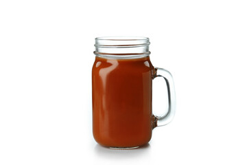 Jar of carrot juice isolated on white background