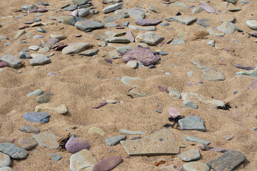 Pebbles at the beach, sand and rocks