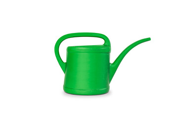 Green watering can on white. © Nancy Pauwels