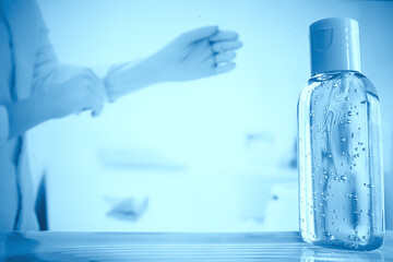 female doctor disinfects hands with antiseptic, doctor's hands clean gloves antiseptic, virus protection conronavirus