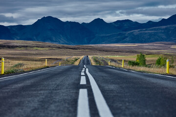 Highway on the background of Iceland mountains