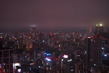 Naklejka premium Aerial view of Skyscraper of Osaka city at night in Japan - 大阪 夜景 摩天楼