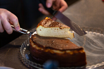 Sansebastian Cheesecake concept, with chocolate sauce,