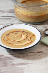 Turkish Lentil Soup with fried butter sauce / Mercimek Corbasi at Restaurant.