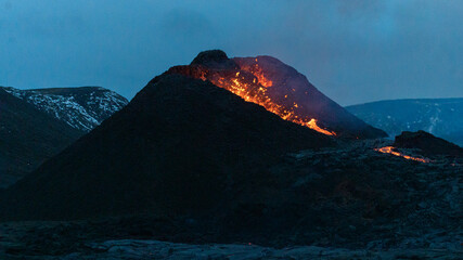 GELDINGADALUR, ICELAND. Erupting Fagradalsfjall volcano at night, 52 km from Reykjavík. View of the eruption in the Reykjanes peninsula. 