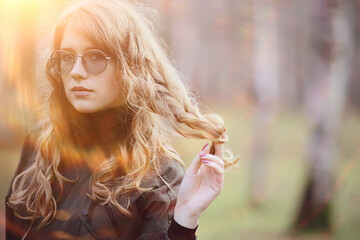 romantic autumn portrait of model, woman, in the autumn seasonal look outside, weather autumn