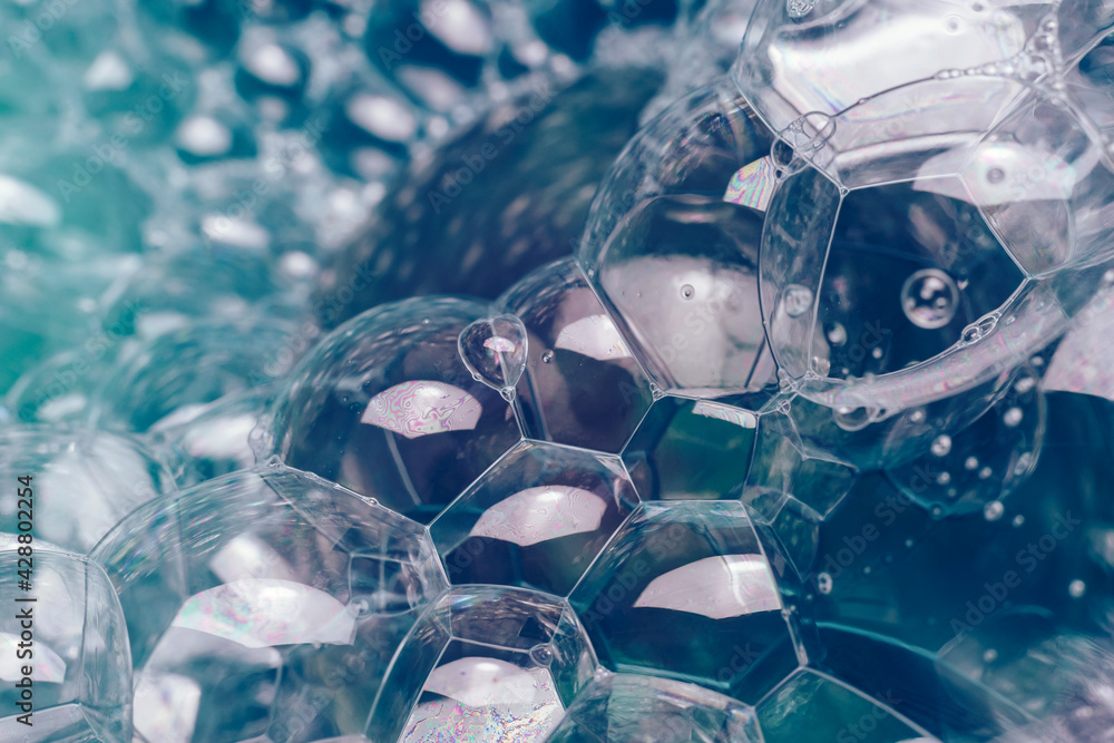 Fototapete close up beautiful abstract soap bubbles. background pattern for design. macro photography view.