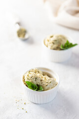 Vegan ice cream with hemp protein in white bowls. Sugar, gluten and lactose free.