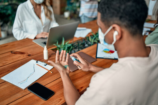 Group of people working in office during Covid-19