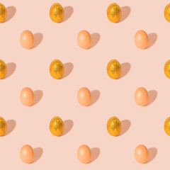 Easter pattern made with gold glitter eggs on pink background. Minimal concept.