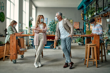 Group of people working in office during Covid-19