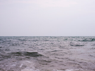 Naklejka na ściany i meble Sea waves lapped the shore the sea..