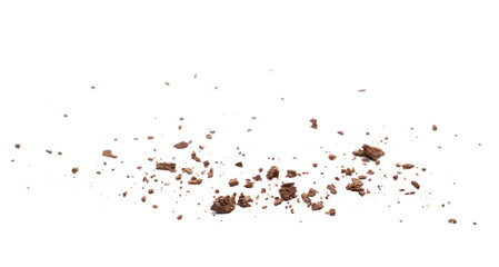 Chocolate crumbs pile isolated on white background