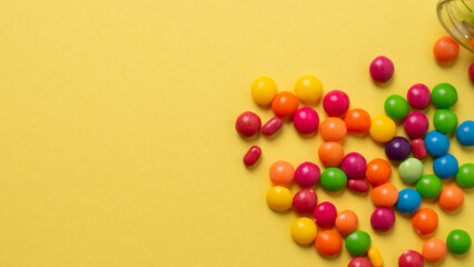 Obraz premium background, blue, board, bright, candies, candy, childhood, chocolate, closeup, coated, colorful, concept, confectionery, copy, delicious, dessert, easter, eat, food, fun, holiday, isolated, juicy, ma