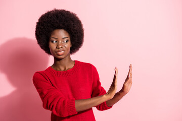 Portrait of attractive trendy girl showing no stop sign disgust bad offer isolated over pink pastel...