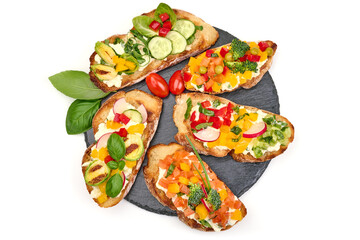 Bruschetta with mozzarella cheese, isolated on white background. High resolution image