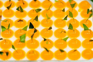 Close up of Thai Jelly Dessert orange fruit shaped, thai street food market