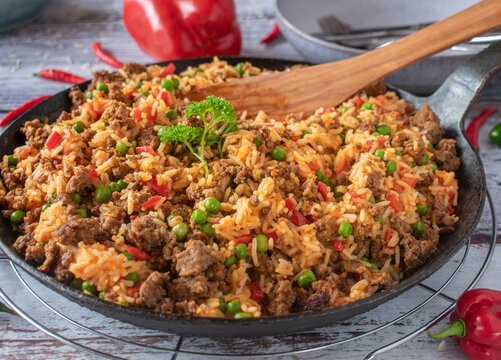 serbian minced meat dish with djuvec rice in a pan