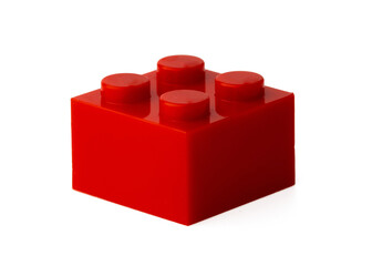 Colored plastic toy building block isolated on white