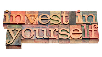 invest in yourself - isolated word abstract in vintage letterpress wood type, self improvement and personal development concept - obrazy, fototapety, plakaty