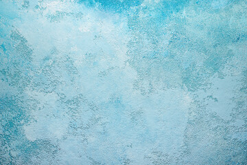 Beautiful abstract grunge decorative light blue cyan painted stucco wall texture. Handmade rough paper white background with copy space, sky texture