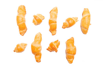 Fresh homemade cakes. Buns. Croissants isolated on white background