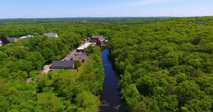 Sandford Mill on Charles River aerial view in Medway historic town center in summer, Medway, Boston Metro West area, Massachusetts MA, USA.