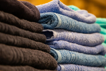 A stack of bath towels close-up. Spa accessories for health care.
