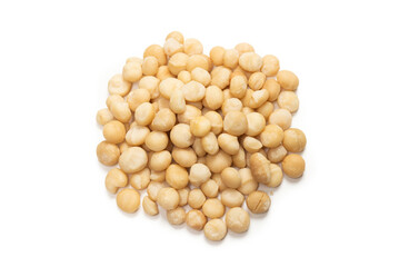 Macadamia nuts isolated on white background.