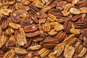 Tasty pecan-nut background. Top view.