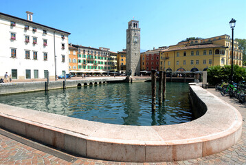 Naklejka premium Lake Garda is the largest lake in Italy in Veneto near Verona. Beautiful and mild place for holidays. Here the village of Riva Garda