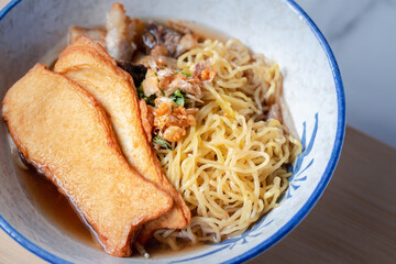 Egg Noodles with Fish Balls in Clear Soup