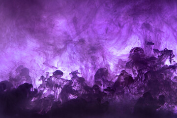 Abstract background picture with purple ink dissolving in water