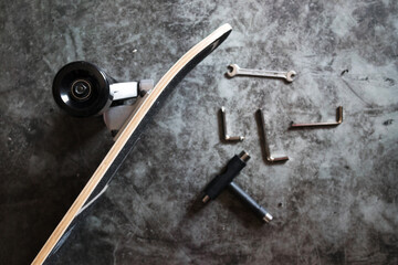 Surf skateboard parts, tools and assembly. Top view of skateboard assembling parts.