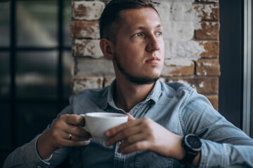 person drinking coffee