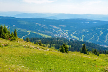 Obraz premium Beautiful landscape of valley in Alpine mountains, small trail, hike root, majestic picturesque view in sunny day