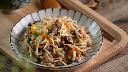 Pork julienne fried with water bamboo shred. Delicious homemade food.