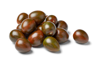 Heap of fresh ripe sweet green striped snack tomatoes isolated on white background 