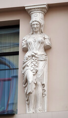 Facade decoration with sculptures and busts of Atlantes