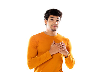 Cute african american man with afro hairstyle wearing a orange T-shirt