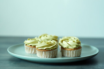 Cupcake topped sweet italian cream with green tea flavor