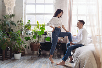young couple spending time in their countryside house