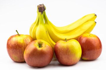 Bananas and apples by close up isolated on a white background.