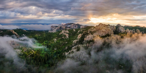 Sunrise fog from Sylvan Lake in Custer State Park - South Dakota