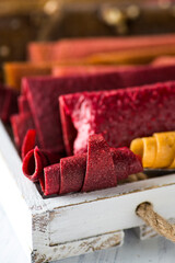 berry and fruit pastille on a wooden board