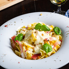 Tagliatelle with gorgonzola masarpone sauce and ham.