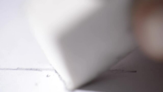 Video of a white eraser erasing pencil scribble