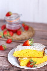 Slice of Shaker Lemon Pie onwhite plate with strawberries. Lemon tart.
