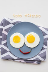 two beautiful eggs on a plate